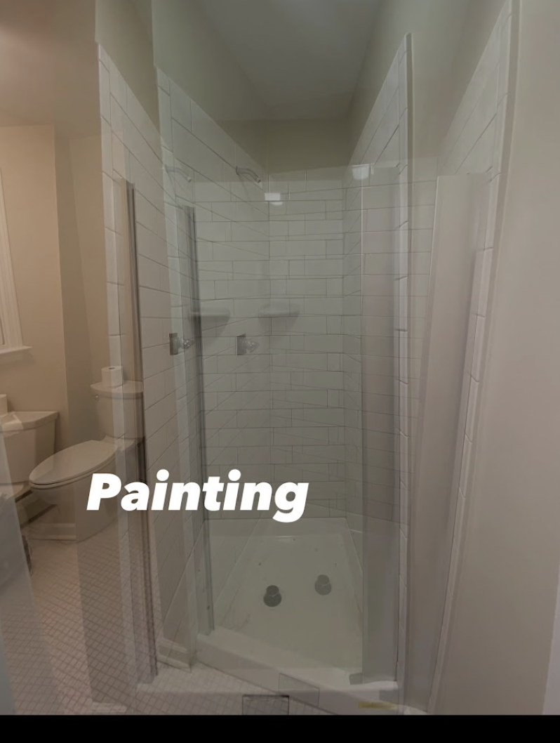 Bathroom project with a tiled shower and Painting text
